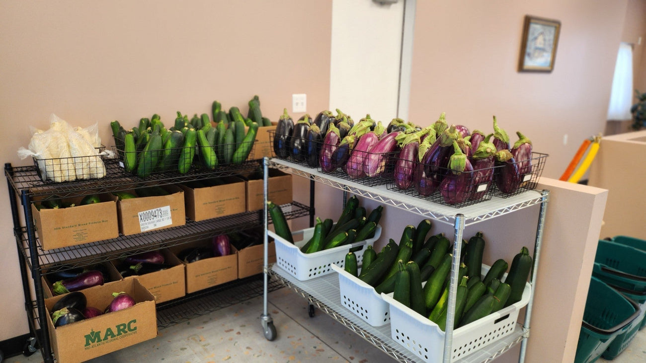 Eggplant and zucchini from AGAR/MARC displayed on produce shelves for distribution at on of Fulfill Food Bank's agency partners in NJ 